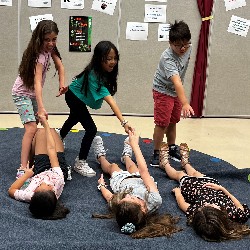 Six TDVA students practice for their drama class.